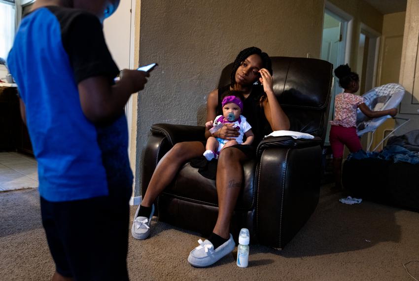 2/10/23, Pineland, Texas: Destiny Williams holds her three month old Irelynn inside her home in Pineland. Ilana Panich-Linsman for The Texas Tribune