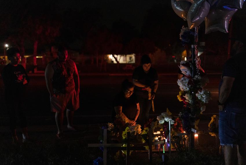 Flora Zavala prays for the eight people dead at the site where a car ran into pedestrians waiting at a bus stop outside a shelter for migrants in Brownsville, on May 7, 2023.