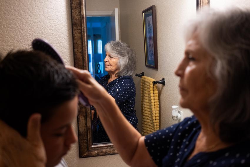 Mercedes Bristol, 68, Executive Director of Texas Grandparents Raising Grandchildren, right, brushes the hair of her youngest grandson, Paul Chavez, 12, right, before his mariachi concert in San Antonio on June 16, 2023. Bristol is the primary caretaker of her five grandchildren, including Chavez, who is the youngest. Bristol has taken care of Chavez since he was five years old. “Paul has attachment disorder, he’s really scared not to have anybody,” Bristol said. “He didn’t see his mother for 10 years until last year when I knew her addiction had gotten better… be doesn’t know anybody but me that’s been there.” Due to the value of her Bristol’s car being too high, even after a recent improvement in House Bill 1287, Bristol and her family are not eligible for Supplemental Nutrition Assistance Program (SNAP) benefits including food stamps starting Sept. 1. “We’re called the invisible foster care, the hidden foster care, nobody knows about this group of people that are raising grandchildren,” Bristol said. “If we die out, it’s just a moment, but if we stay persistent, we’ll see real change,” Bristol said.