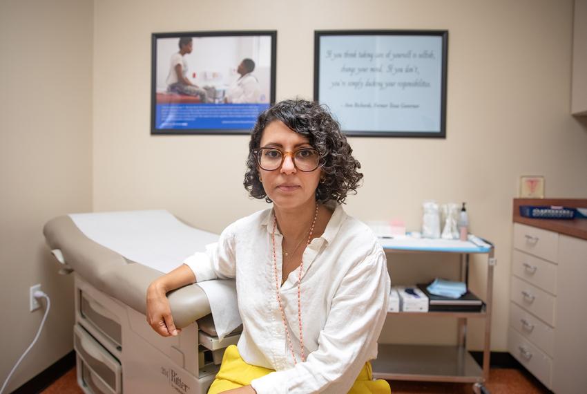 AUSTIN, TX - AUGUST 8: Dr. Amna Dermish, chief operating and medical services officer at Planned Parenthood of Greater Texas poses for a portrait in an exam room in the Planned Parenthood offices in Austin, Texas on August 8, 2023. (Montinique Monroe for The Texas Tribune)
