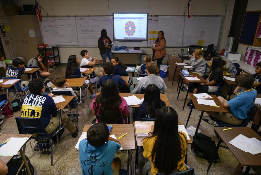 Nimitz Middle School teachers Selena Olivares, center left, and Pricilla Martinez lead their 7th grade English Language Arts and Reading (ELAR) in an activity Wednesday, Sept. 13, 2023 in Odessa. Martinez said that due to the increased amount of families moving to the Permian Basin, they sometimes teach 38 to 40 kids per class. “It’s been six weeks and I still don’t know all of their names… Its embarrassing to me,” Martinez said.