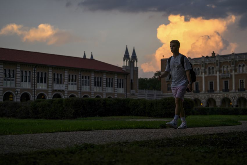 A student walks through campus at Rice University in Houston, Texas, US, on Tuesday, Sept. 26, 2023. In June, Gov. Greg Abbott signed a bill that prohibits diversity, equity and inclusion offices in Texas public colleges and universities starting in 2024.