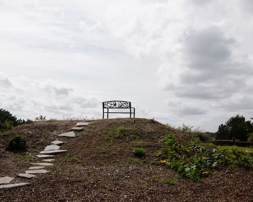 Austin, TX -- Monday, Nov. 6, 2023: A bench looks out onto the horizon in one of the community gardens.