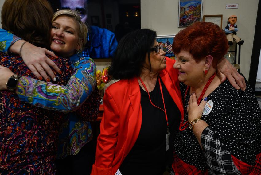 Ector County Independent School District School Board President Delma Abalos hugs political action committee chairwoman Sara Moore after one of the bond propositions passed to construct a new middle school and make existing repairs during an election night watch party on Tuesday, Nov. 7, 2023, in Odessa.