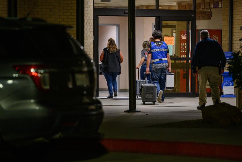 Ector County elections officials move ballots and voting equipment into the county annex after polls closed on election night Tuesday, Nov. 7, 2023, in Odessa.