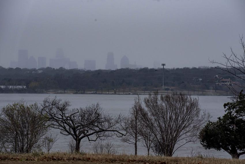 The Dallas skyline is barely visible from Winfrey Point in Dallas on Dec. 22, 2022. Temperatures dropped from 45 degrees at 9 a.m. to 25 degrees shortly before noon.