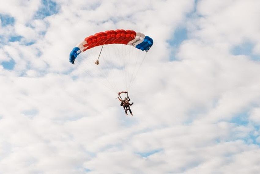Gov. Greg Abbott skydives in a tandem jump in San Marcos on Nov. 27, 2023. The governor skydived for his first time with 106-year-old World War II veteran Al Blaschke, who holds the the Guinness World Record for the world's oldest tandem parachute jump.
