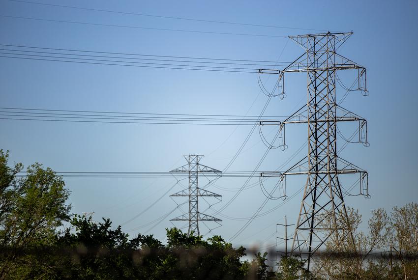 Electrical power lines near the Austin Energy/Sand Hill Energy Center in Del Valle on March 24, 2020.