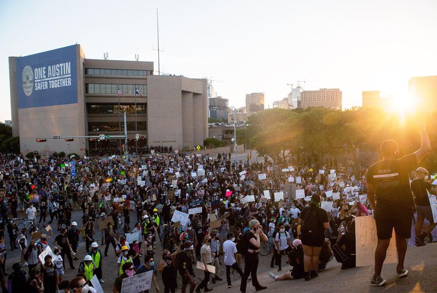 Demonstrators gather outside Austin Police headquarters for another night of protest against police violence towards people of color, in Austin on June 4, 2020.