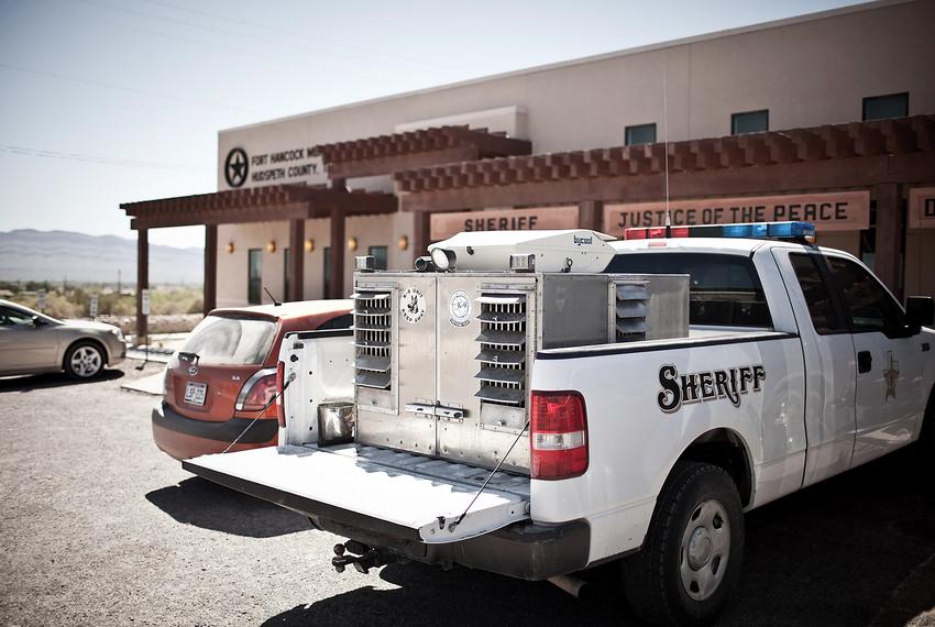 A K-9 unit sits outside the Hudspeth County Sheriff's office in Fort Hancock on May 19, 2010.