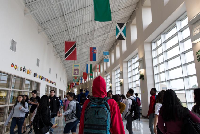 High school students walk to their next class after the bell rings at Elsik Ninth Grade Center in Houston on March 28, 2018.