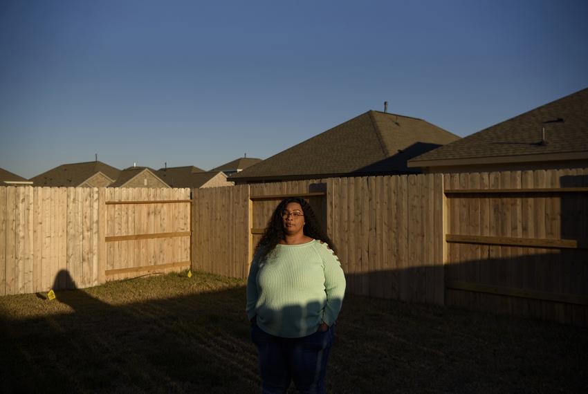 Nakisha Platt, 47, poses for a portrait at her home, which she recently purchased with the help of the Community Land Trust, a nonprofit organization that aims to make homeownership affordable for low-income households, in Porter, Texas, U.S., on Friday, January 13, 2023. Despite its goal of creating more than 1,000 permanently affordable homes in five years, the Community Land Trust has only 100 homes in its trust and the city of Houston may cut its funding significantly.