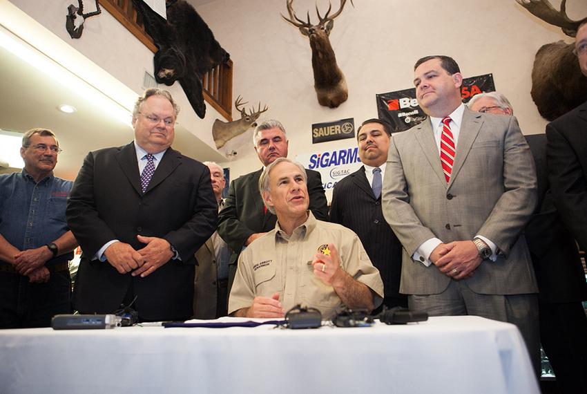 Gov. Greg Abbott in Pflugerville, Texas, for signing of open-carry bill on June 13, 2015.