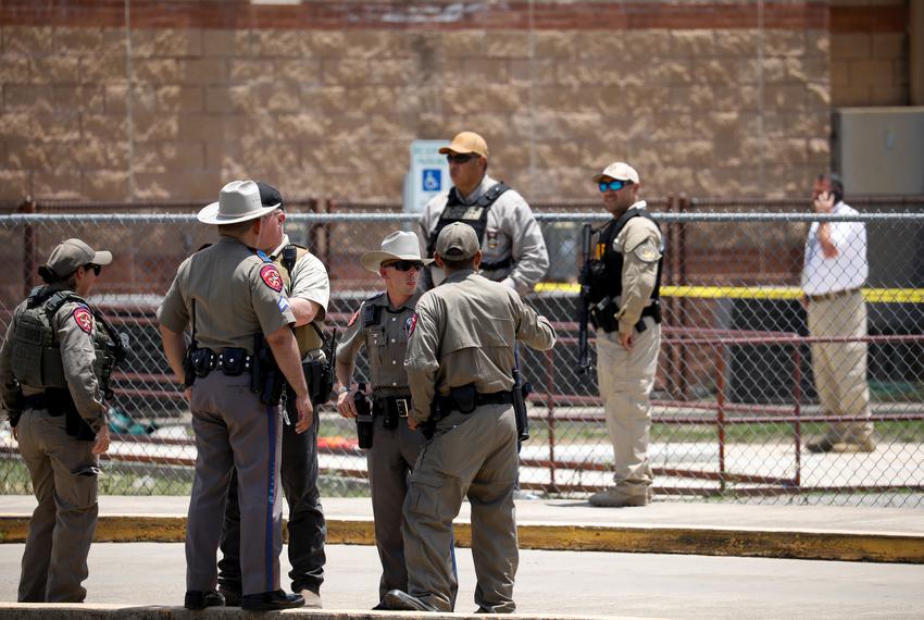 Texas Department of Public Safety officers guard the scene at Robb Elementary School in Uvalde on May 24, 2022.