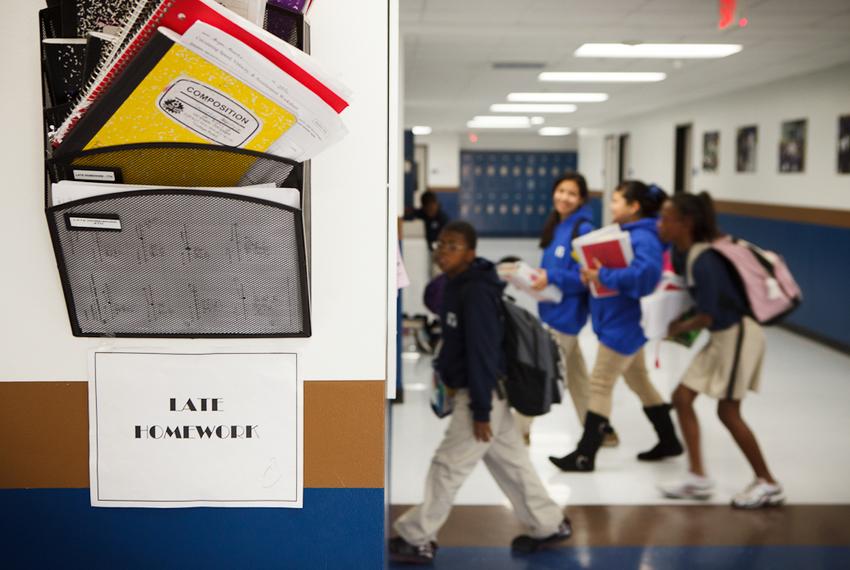 Students enter a classroom one one of the 11 Houston-area campuses of Yes Prep, a public charter school system serving 7,000 low-income students.